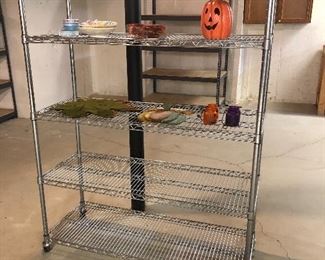 Rolling racks and metal and wood shelving