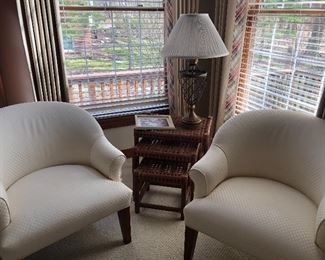 2 Ivory club chairs by R Jones - Dallas,  leather nesting tables by McGuire,  and iron and brass lamp