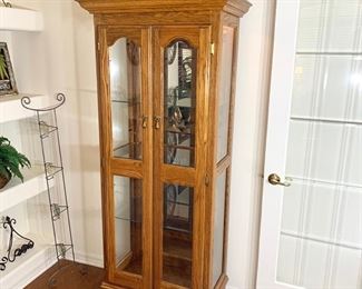 Oak 2 Door Lighted Curio Cabinet measures 32" x 18" x 74"