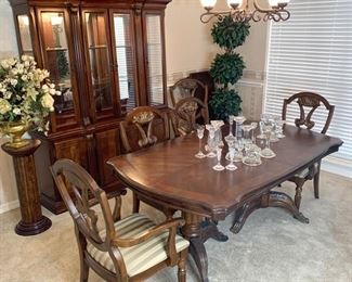 Dining Table w/6 Chairs (1 Leaf) measures                       42" x 72"/90" China Cabinet measures 61" x 16" x 82"