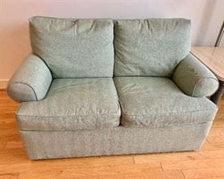 $250 - Beachley Furniture Co., two cushion love seat sleeper sofa. 33"H x 63"W x 39"D  THIS ITEM REQUIRES A PROFESSIONAL MOVER