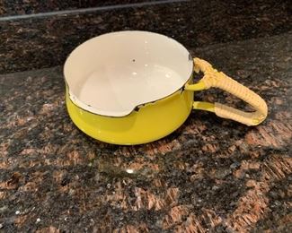$20 - Yellow Dansk Designs single lip gravy server with handle; minor chips to enamel consistent with age; 4 in. W x 2 in .H