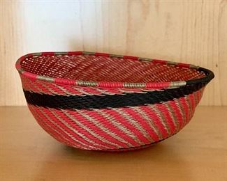$75 - Decorative red wire basket; 6 in. diameter x 3 in. H