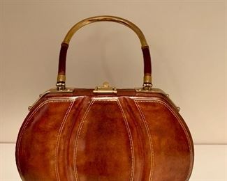 $75 - #2 Vintage  "A. Antinori Roma" genuine calf leather purse with gold tone and leather handle.; 8 in. L  x 11 in. H (with handle extended); 6 in. W when opened.  