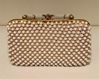 $20 - Vintage beaded evening bag with beaded and gold toned handle; "Marcus Brothers Made in Hong Kong;" 8 in. L x 4 1/2 in. H (without handle) and 8 in. H with handle