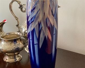 $75 - Ceramic vase; signed on base; 11 in. H