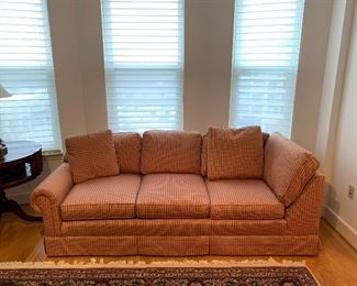 Detail of sectional sofa with asymmetrical arms (note photo) ; Approx. 88 in. L x 33 in. H (including pillow height) x 36 in, deep x 18 1/2 in. seat height