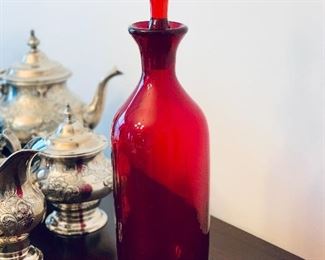 $40 - Hand blown art glass red decanter; 14 in. H with stopper