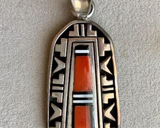 $40 - Richard Begay Sterling pendant with inlaid stone; marked STERLING and RB on reverse;Jewelry #9;  2 1/2"