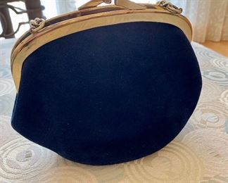 $24 - #10 Vintage blue Ingber bag with gold toned chain and gold toned clasp and trim; approx. 9 in. L x 7 1/2 in. H