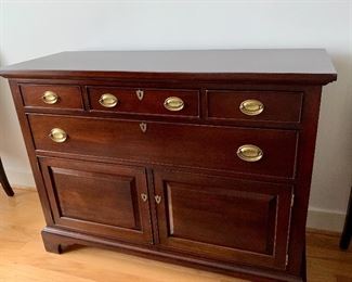 $495 - Authentic Reproduction by Craftique (Mebane N.C.) Mahagony hunt chest with four drawers, two cabinets and oval brass pulls. Top three drawers are felt lined. Some wear consistent with use and age. Minor nicks on surface top; 36"H x 48"W x 18"D 