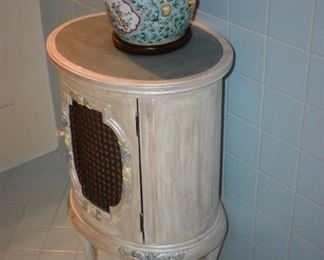 Antique Chalked White Antique footed oval Cabinet with padded paw feet and Antique Chinese Famille Rose Ginger Jar with Foo Dog "topper" on lid.