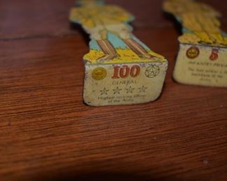 Antique Metal MAR Toy Soldiers: The one on the left is signed "100 General" "Highest Ranking officer in the Army.                                                                                                     
The one on the right is imprinted with "5 Infantry Private. The foot soldier is the backbone of the Army."