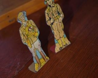 Antique Metal MAR Toy Soldiers: The one on the left is signed "100 General" "Highest Ranking officer in the Army.                                                                                                     
The one on the right is imprinted with "5 Infantry Private. The foot soldier is the backbone of the Army."