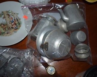 Another Rare Antique Childs Set of Cookware, including Coffee Pots this set being Aluminum. You can also see an Alice in Wonderland Childs Wrist Watch!