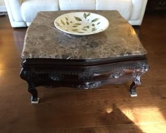 Marble top coffee table. $200.00