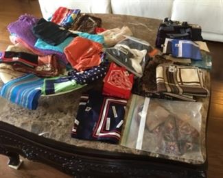 Scarves - mostly silk, some cotton - several designer silk scarves - vary in price from $5 to $50.00