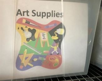 Tubs of art supplies