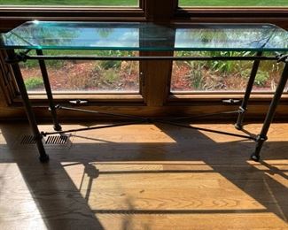 Cast iron console table with glass top