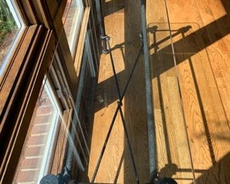 Cast iron console table with glass top