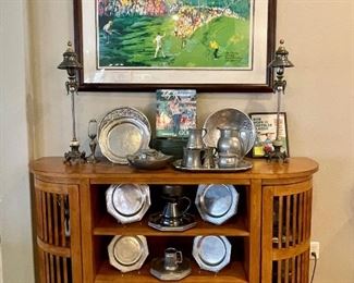 Leroy Neiman serigraph and a great pewter collection on a contemporary sideboard
