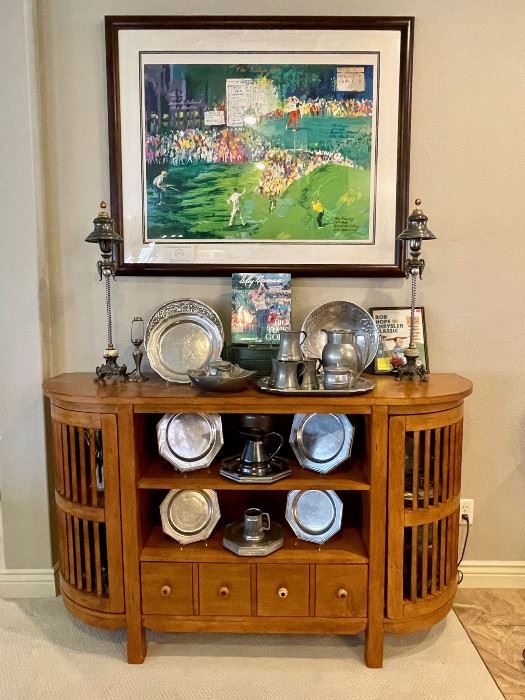Leroy Neiman serigraph and a great pewter collection on a contemporary sideboard