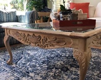 Glass and light wood coffee table