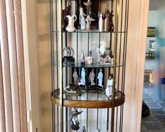 Birdcage display shelf with collectibles 