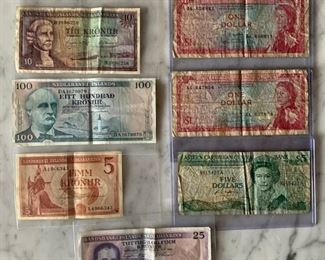 Some obsolete / obscure foreign currency:
Landsbanki Islands Sedlabankinn
Sedlabanki Islands 
East Carribean Central Currency
