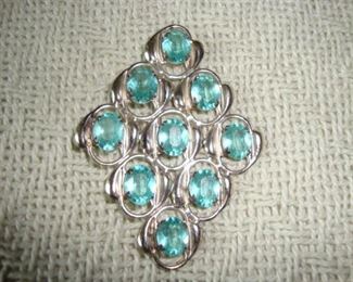 Vintage aquamarine brooch and other costume jewelry vintage and newer...lots of clip earrings too