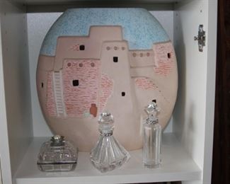South Western adobe themed vase. Three piece perfume bottles.