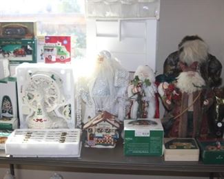 Santas of all sizes and Department 56 Christmas cottages and village scenes.