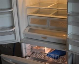 Kenmore double door refrigerator with lower freezer, like new.