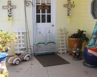 Yard decor, garden bench, plants, pots, crosses, angels, fish, turtles and rabbits.