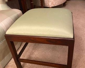 Upholstered mahogany ottoman