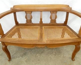 UNUSUAL CANE BOTTOM PARLOR SEAT 