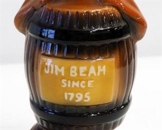 Norcrest Skull And Crossbone Decanter #J-381, Jim Beam Convention Figurine,  And Six Eyed Guy Decanter