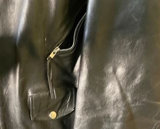 UNIK Black Leather Motorcycle Jacket	SZ: 60	
