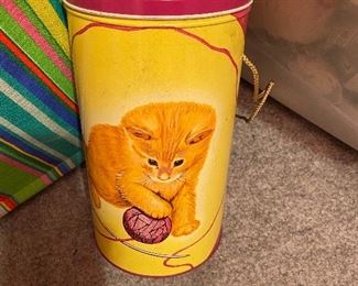 Cute..Tin Holds Yarn. Yarn Pulled through the top.