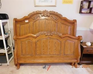 Queen size oak bed.