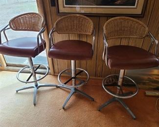 1970's Chromcraft style bar stools. Set of 3. Upholstered seats and wicker backs. Great condition! Asking $800 for the set.