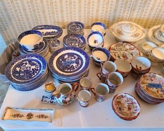 China dish sets. Antique Wedgwood English China in "Blue Willow" pattern. Service for 12, nearly complete. Asking $650. Antique Japanese Kutani Geisha hand-painted cups and saucers. Asking $100.