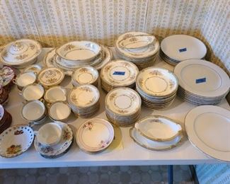 Vintage Noritake dish set. Service for 12 with multiple serving dishes, cups and saucers, gravy boat. Asking $1,000. 10 Strawberry Street silver double line set of 8 dinner plates. Asking $80. "Moderne" by Harmony House China, set of 6 dinner plates. Asking $50.