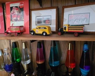 Coca-Cola coin banks and prints. Lava lamps. Various prices. Come see!