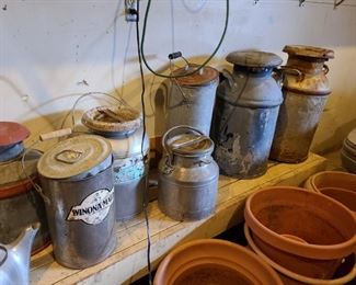 Vintage milk cans. $10-$40 each.