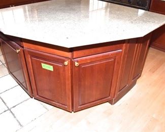 $1,400 to include: cabinets custom built by IXL cabinets, island, counters, sink, faucet