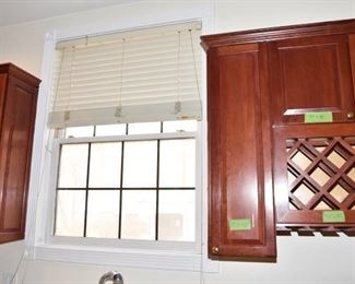 $1,400 to include: cabinets custom built by IXL cabinets, island, counters, sink, faucet