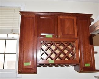 $1,400 to include: cabinets custom built by IXL cabinets, island, counters, sink, faucet