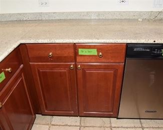 $1,400 to include: cabinets custom built by IXL cabinets, island, counters, sink, faucet
