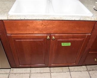 $1,400 to include: cabinets custom built by IXL cabinets, island, counters, sink, faucet